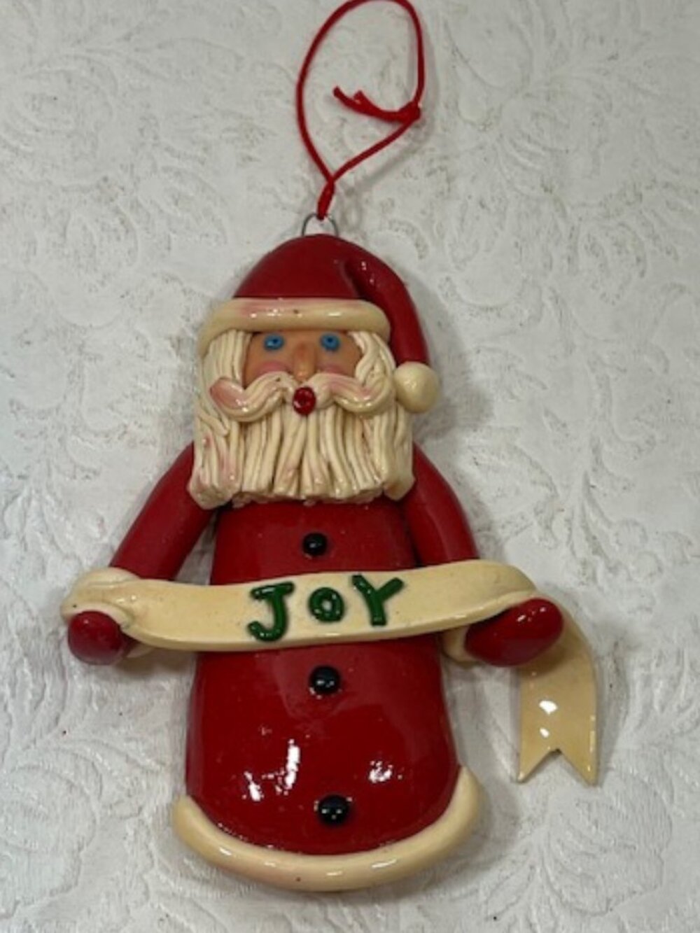 VTG Handcrafted Polymer Clay Santa Holding "JOY" Ribbon Christmas Ornament 4.5"